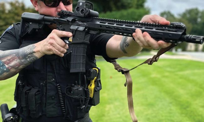 Law enforcement officer shooting the patrol doc ar 15