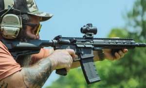 Breaded man shooting Shorty Doc ar 15 SBR