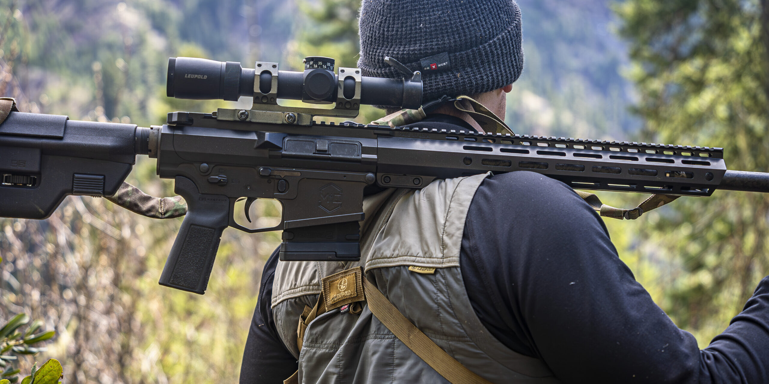 Savage Bear Hunt_Edit_19 Caleb with mitchell defense rifle