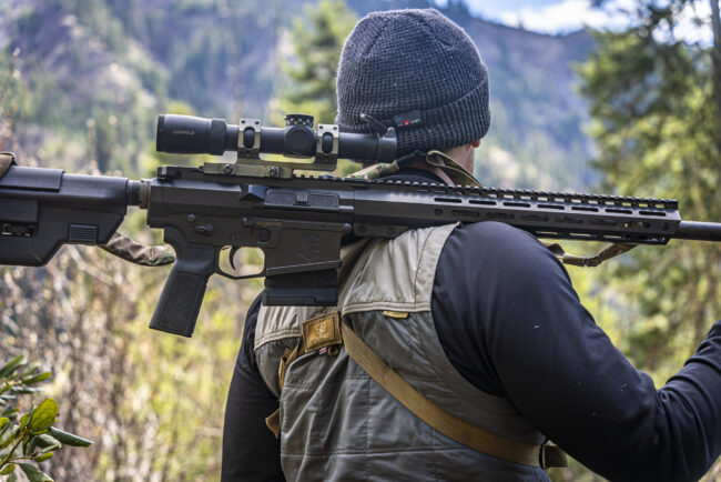 Savage Bear Hunt_Edit_19 Caleb with mitchell defense rifle